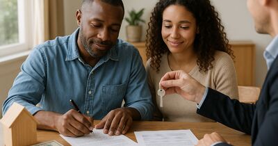 Signed land contract on a desk beside a calculator and a Florida county parcel map